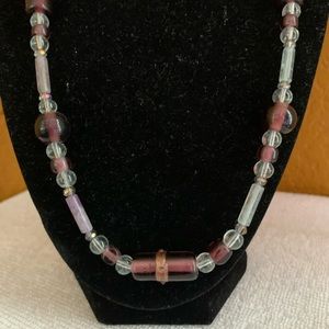 Purple and clear glass bead necklace